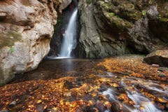 Beautiful River Waterfall In Autumn Forest, A Small Waterfall Part Of Fotinski Waterfalls, Rhodope Mountains, Bulgaria Royalty Free Stock Image