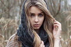 beautiful sad girl is walking in the field. Photo in brown tones. royalty free stock photos beautiful sad girl is walking in the field. Photo in brown tones. royalty free stock photos