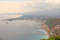 Beautiful Scenic View of the Sea, Green Forest, Taormina`s Old Town and Etna Volcano. The island of Sicily, Italy stock images Beautiful Scenic View of the Sea, Green Forest, Taormina`s Old Town and Etna Volcano. The island of Sicily, Italy stock images