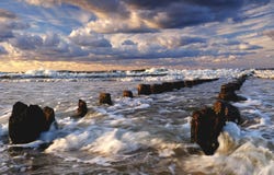 Beautiful sea landscape, storm on the Baltic Sea, cloudy sky, waves break over the breakwaters. royalty free stock image Beautiful sea landscape, storm on the Baltic Sea, cloudy sky, waves break over the breakwaters. royalty free stock image