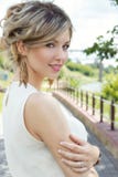 Beautiful cute girl with big lips and red lipstick with bared shoulders with a bouquet of daisies at sunset on a sunny warm stock photography Beautiful cute girl with big lips and red lipstick with bared shoulders with a bouquet of daisies at sunset on a sunny warm stock photography