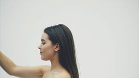 A beautiful slim girl eats healthy fruits. Portrait of a pretty young woman holding a ripe grape bouquet and a truth stock video A beautiful slim girl eats healthy fruits. Portrait of a pretty young woman holding a ripe grape bouquet and a truth stock video