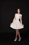 Beautiful Smiling Girl In A Light Dress Posing Standing Royalty Free Stock Image Beautiful Smiling Girl In A Light Dress Posing Standing Royalty Free Stock Image