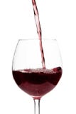Beautiful splash of red wine in a glass on white background stock photos Beautiful splash of red wine in a glass on white background stock photos
