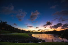 Beautiful Sunset Over The Lake Near The Golf Course In A Tropical Resort, Punta Cana Royalty Free Stock Images