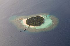 Beautiful Tropical Island At Ocean Aerial View From Seaplane At Maldives Royalty Free Stock Images