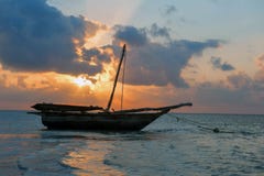Beautiful tropical sunset with boat Stock Photo Beautiful tropical sunset with boat Stock Photo