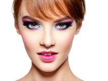 Beautiful woman with bright vivid purple make-up stock image Beautiful woman with bright vivid purple make-up stock image