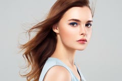 Beautiful Woman Brunette Healthy Beauty Skin Smile. Spa Beautiful Model Girl Cute Face over gray background. stock photography Beautiful Woman Brunette Healthy Beauty Skin Smile. Spa Beautiful Model Girl Cute Face over gray background. stock photography