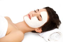 Beautiful Woman With Cosmetic Mask on Face. Girl Gets Treatment stock photo Beautiful Woman With Cosmetic Mask on Face. Girl Gets Treatment stock photo