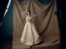 beautiful woman in dress photoshoot posing studio