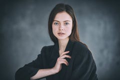 Beautiful Woman Face Closeup On A Dark Background Stock Image