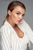 Beautiful Woman In Fashion Clothes With Makeup And Hairstyle royalty free stock images Beautiful Woman In Fashion Clothes With Makeup And Hairstyle royalty free stock images