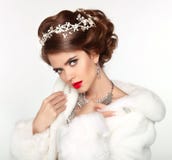 Beautiful woman in fashion white Mink Fur Coat. Luxury Winter Gi Royalty Free Stock Image Beautiful woman in fashion white Mink Fur Coat. Luxury Winter Gi Royalty Free Stock Image