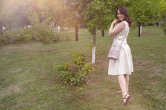 Beautiful woman in a green garden royalty free stock images Beautiful woman in a green garden royalty free stock images