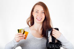 Beautiful woman holding new delivered shoes in one hand and cred royalty free stock images Beautiful woman holding new delivered shoes in one hand and cred royalty free stock images