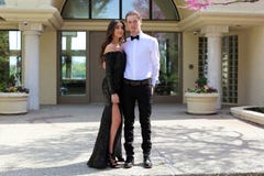 Beautiful Woman In Back Prom Dress And Handsome Guy In Suit, Teenager Ready For A Luxury Night. Stock Images