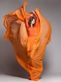 Beautiful Woman In Long Orange Dress Posing Dramatic Royalty Free Stock Photo Beautiful Woman In Long Orange Dress Posing Dramatic Royalty Free Stock Photo