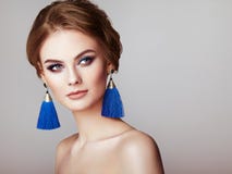 Beautiful Woman with Large Earrings Tassels royalty free stock image Beautiful Woman with Large Earrings Tassels royalty free stock image