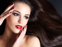 Beautiful woman with long brown straight hairs Stock Photos Beautiful woman with long brown straight hairs Stock Photos