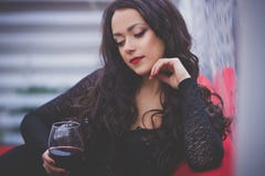 https://thumbs.dreamstime.com/t/beautiful-woman-long-hair-drinking-red-wine-restaurant-curly-sexy-black-clothes-50001557.jpg