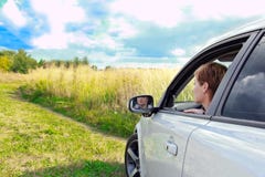 Beautiful Woman Looking From The Car Royalty Free Stock Image