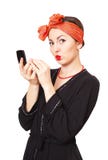 Beautiful woman with a pocket mirror Stock Image Beautiful woman with a pocket mirror Stock Image