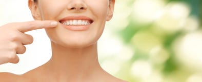 Beautiful Woman Pointing To Teeth Royalty Free Stock Photo Beautiful Woman Pointing To Teeth Royalty Free Stock Photo