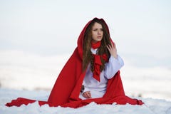 beautiful-woman-red-cloak-sitting-snow-winter-42937455 49