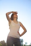 Beautiful woman standing against the sky. Sunny day royalty free stock photos Beautiful woman standing against the sky. Sunny day royalty free stock photos
