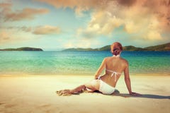 https://thumbs.dreamstime.com/t/beautiful-woman-white-bikini-sunbathing-beach-b-background-islands-32006273.jpg