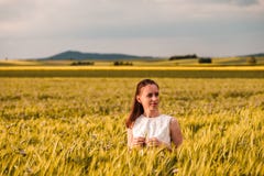 https://thumbs.dreamstime.com/t/beautiful-woman-white-dress-golden-yellow-wheat-field-warm-sunshine-under-dramatic-sky-fresh-vibrant-colors-rhine-98672565.jpg
