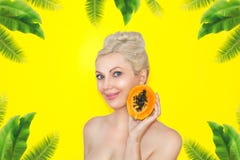 Beautiful young blond woman with papaya in hands. The concept of healthy skin and moisturizing. Advantages of fruit. royalty free stock photography Beautiful young blond woman with papaya in hands. The concept of healthy skin and moisturizing. Advantages of fruit. royalty free stock photography