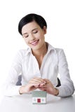 Beautiful businesswoman with house model Royalty Free Stock Image Beautiful businesswoman with house model Royalty Free Stock Image