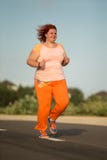 Beautiful Young Fat Woman Is Runing Stock Image