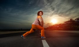 Beautiful Young Fat Woman Warming Up Royalty Free Stock Images