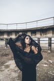Beautiful young girl on the background of the dam in a dried up stock image Beautiful young girl on the background of the dam in a dried up stock image