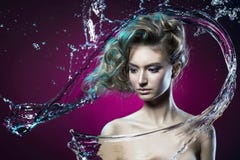 beautiful young girl covered with water splash on a violet background royalty free stock images beautiful young girl covered with water splash on a violet background royalty free stock images