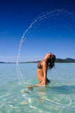 Beautiful Young Girl Flicking Hair In Water Stock Photos