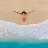 Beautiful Young Girl In Bikini On A Tropical Beach. Blue Sea In Stock Image