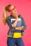 Beautiful young happy woman in yellow t shirt holds folder pose royalty free stock photography Beautiful young happy woman in yellow t shirt holds folder pose royalty free stock photography