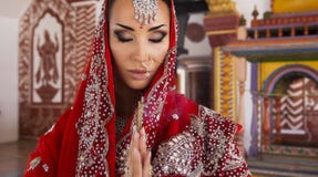 Beautiful young indian woman in traditional clothing with bridal Royalty Free Stock Image Beautiful young indian woman in traditional clothing with bridal Royalty Free Stock Image