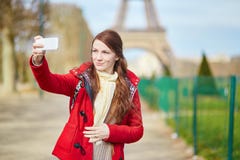 https://thumbs.dreamstime.com/t/beautiful-young-tourist-paris-doing-self-picture-selfie-using-her-mobile-phone-near-eiffel-tower-55487220.jpg