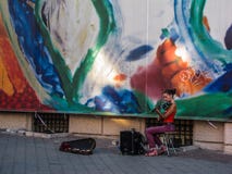 Beautiful young Ukrainian girl street musician