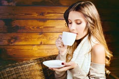 Beautiful Young Woman Holding A Coffee Cup Royalty Free Stock Photos