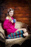 Beautiful Young Woman Holding A Coffee Cup Royalty Free Stock Photography