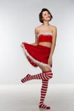 Beautiful Young Woman In A Red Skirt Celebrates Christmas Royalty Free Stock Photo