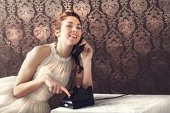 Beautiful young woman on the phone in living room royalty free stock photos Beautiful young woman on the phone in living room royalty free stock photos