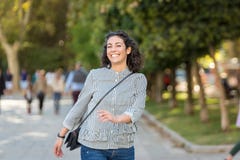 Beautiful young woman having fun in park royalty free stock photo Beautiful young woman having fun in park royalty free stock photo