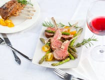 Beautifully grilled lamb rib chop steaks, medium rare . royalty free stock photos Beautifully grilled lamb rib chop steaks, medium rare . royalty free stock photos